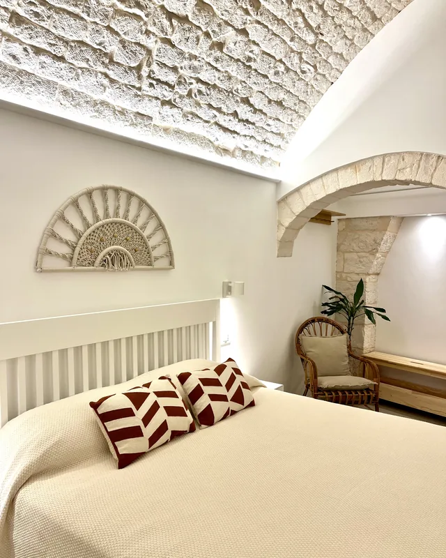 Volta in pietra pugliese — l'identità architettonica della suite